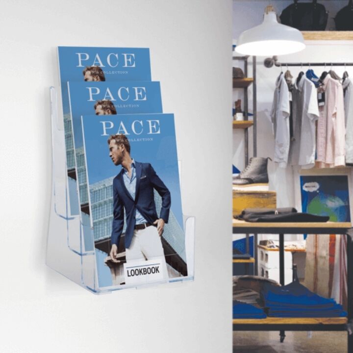 Wall mounted leaflet holder displaying promotional materials.png