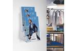Wall mounted leaflet holder displaying promotional materials.png