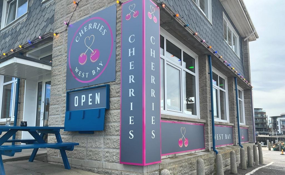 Signage and Sunshine for Cherries in West Bay