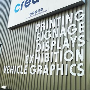 Large Acrylic Lettering Mounted to Cladding