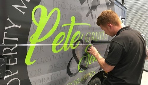 Close up of vehicle graphics install